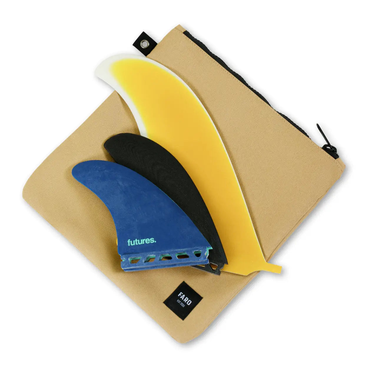 Three surf fins (yellow, blue, black) on a beige carrying case with 'futures' branding.